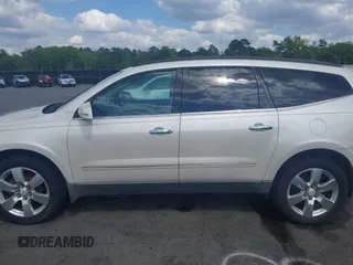 2011 Chevrolet Traverse LTZ with VIN 1GNKVLED5BJ167465, listed as a IAAI auction lot 42002979 with 167,271 mi miles and . Bid and sale history available at DreamBid. Image 14.