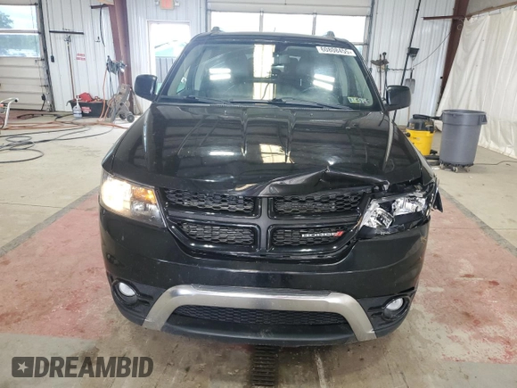 2015 Dodge Journey Crossroad with VIN 3C4PDDGGXFT725744, listed as a Copart auction lot 60808455 with 210,141 mi miles and Salvage title. Bid and sale history available at DreamBid. Image 5.