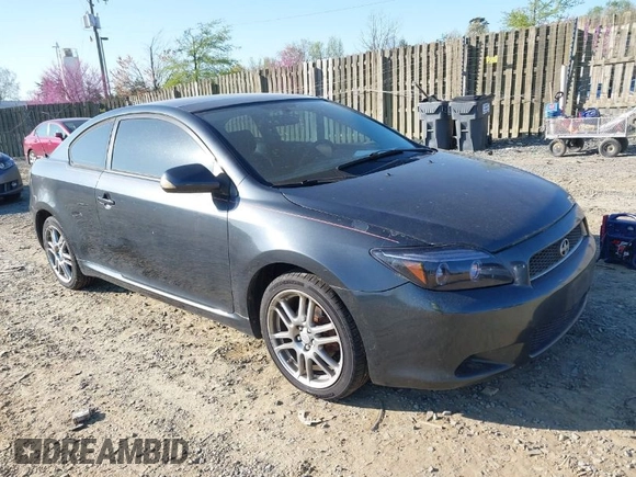 2007 Scion tC Spec with VIN JTKDE177X70187780, listed as a IAAI auction lot 41983327 with 168,794 mi miles. Bid and sale history available at carsss.com. Image 1.