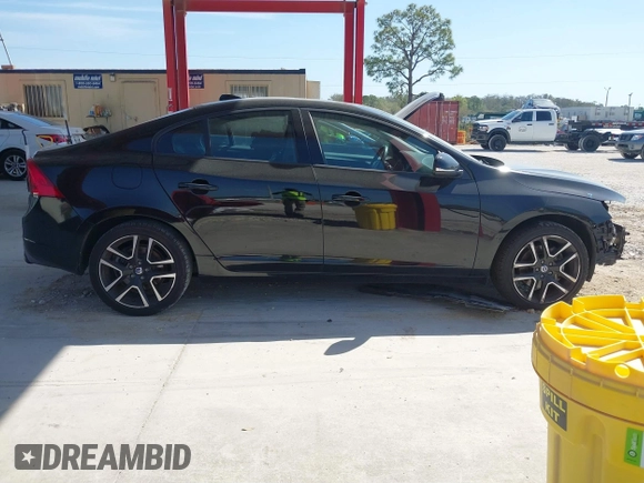 2017 Volvo S60 Dynamic with VIN YV140MTL8H2432506, listed as a IAAI auction lot 41699488 with 119,907 mi miles. Bid and sale history available at carsss.com. Image 14.