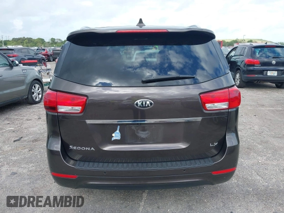 2018 Kia Sedona LX with VIN KNDMB5C15J6382599, listed as a IAAI auction lot 41964769 with 82,494 mi miles. Bid and sale history available at carsss.com. Image 16.