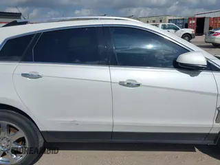 2012 Cadillac SRX Premium Collection with VIN 3GYFNCE38CS517912, listed as a IAAI auction lot 42435672 with 193,103 mi miles and . Bid and sale history available at DreamBid. Image 13.