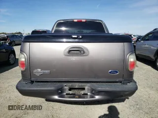 2002 Ford F-150 Harley Davidson with VIN 1FTRW07342KC78218, listed as a Copart auction lot 78273304 with 217,968 mi miles and Salvage Title. Bid and sale history available at carsss.com. Image 6.