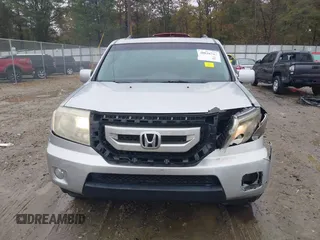 2010 Honda Pilot Touring with VIN 5FNYF3H89AB005861, listed as a IAAI auction lot 40828747 with 275,757 mi miles and . Bid and sale history available at DreamBid. Image 12.