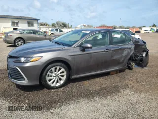 2024 Toyota Camry LE z VIN 4T1C11AKXRU199902, wystawiony jako Copart lot #54422715 z przebiegiem 17 418 mil mil oraz Szkoda całkowita • Salvage title. Historia ofert i sprzedaży dostępna na DreamBid. Obrazek 1.