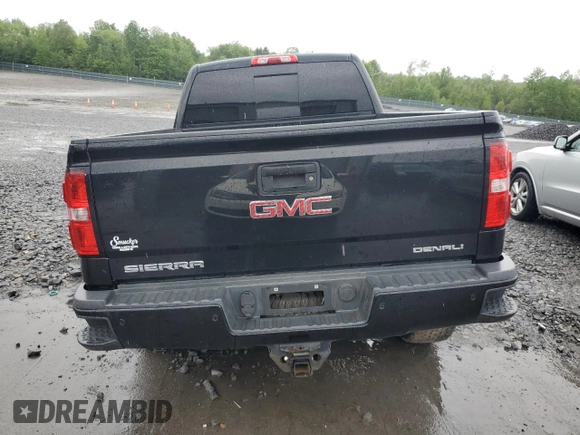 2015 GMC Sierra 2500HD Denali z VIN 1GT120E82FF100619, wystawiony jako Copart lot #58014705 z przebiegiem 188 525 mil mil oraz Szkoda całkowita • Salvage title. Historia ofert i sprzedaży dostępna na DreamBid. Obrazek 6.