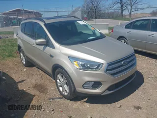 2017 Ford Escape SE with VIN 1FMCU0GD3HUC94245, listed as a IAAI auction lot 41877799 with 214,571 mi miles. Bid and sale history available at carsss.com. Image 1.