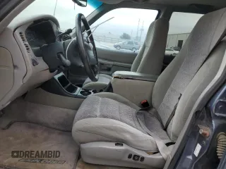 1998 Ford Explorer XLT with VIN 1FMZU32P0WUD21265, listed as a Copart auction lot 73702364 with 211,096 mi miles and Salvage title. Bid and sale history available at DreamBid. Image 7.