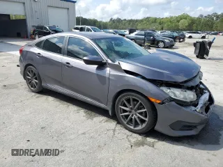 2017 Honda Civic Sedan LX with VIN 19XFC2F52HE062826, listed as a Copart auction lot 50692755 with 123,569 mi miles and Salvage Title. Bid and sale history available at carsss.com. Image 4.