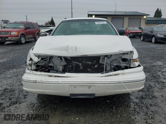 1995 Ford Crown Victoria LX с VIN 2FALP74W1SX200511, выставлен на аукционе Copart как лот 48807055 с пробегом 62 133 миль миль и Списание • Salvage title. История ставок и продаж доступна на DreamBid. Изображение 5.