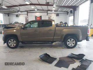 2015 GMC Canyon 2WD SLE with VIN 1GTG5BE31F1166383, listed as a IAAI auction lot 41640378 with 334,016 mi miles. Bid and sale history available at carsss.com. Image 14.