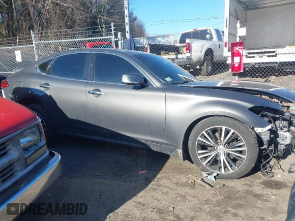 2015 Infiniti Q70 with VIN JN1BY1AR0FM562523, listed as a IAAI auction lot 41310831 with 73,870 mi miles and . Bid and sale history available at DreamBid. Image 13.