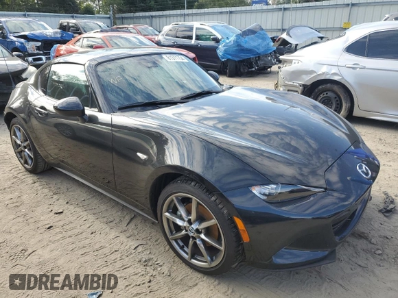 2022 Mazda MX-5 Miata Grand Touring z VIN JM1NDAM78N0507632, wystawiony jako Copart lot #81311754 z przebiegiem 4 720 mil mil oraz Szkoda całkowita • Salvage title. Historia ofert i sprzedaży dostępna na DreamBid. Obrazek 4.
