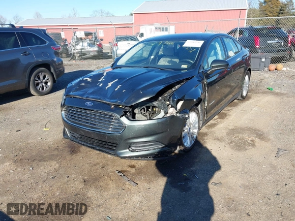 2015 Ford Fusion S Hybrid with VIN 3FA6P0UU7FR117785, listed as a IAAI auction lot 41589546 with 136,657 mi miles. Bid and sale history available at carsss.com. Image 6.