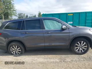 2019 Honda Pilot EX-L with VIN 5FNYF6H52KB035504, listed as a IAAI auction lot 42642735 with 54,736 mi miles and . Bid and sale history available at DreamBid. Image 13.