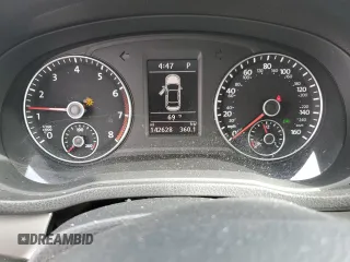 2014 Volkswagen Passat SE z VIN 1VWBT7A30EC076841, wystawiony jako Copart lot #52970685 z przebiegiem 142 628 mil mil oraz Szkoda całkowita • Salvage title. Historia ofert i sprzedaży dostępna na DreamBid. Obrazek 9.