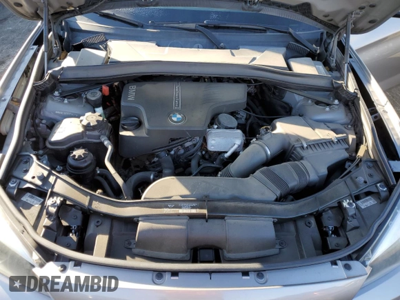 2014 BMW X1 xDrive28i with VIN WBAVL1C51EVY19441, listed as a Copart auction lot 44076115 with 107,830 mi miles and Salvage Title. Bid and sale history available at carsss.com. Image 12.
