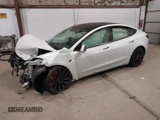 2021 Tesla Model 3 Performance with VIN 5YJ3E1ECXMF991836, listed as a IAAI auction lot 41830519 with Not Provided miles and . Bid and sale history available at carsss.com. Image 19.