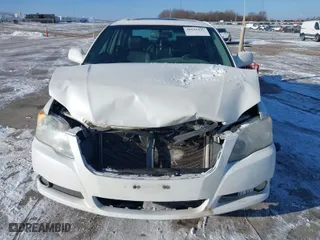 2009 Toyota Avalon XL with VIN 4T1BK36B49U341917, listed as a IAAI auction lot 40955142 with 201,734 mi miles. Bid and sale history available at carsss.com. Image 6.