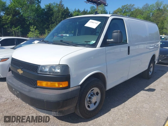 2019 Chevrolet Express Cargo Van with VIN 1GCWGAFP5K1296131, listed as a IAAI auction lot 42082742 with 217,740 mi miles. Bid and sale history available at carsss.com. Image 2.