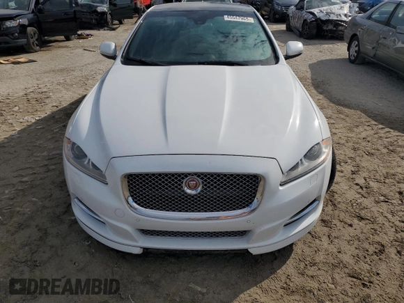2015 Jaguar XJ with VIN SAJWA1CZ9F8V88418, listed as a Copart auction lot 45547965 with 82,423 mi miles and Salvage Title. Bid and sale history available at carsss.com. Image 5.