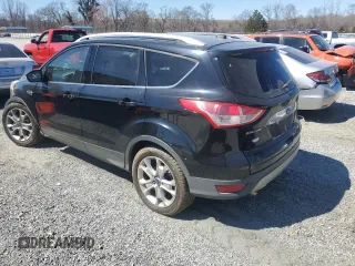 2016 Ford Escape Titanium with VIN 1FMCU9J98GUA77653, listed as a Copart auction lot 49594515 with 186,002 mi miles and Salvage Title. Bid and sale history available at DreamBid. Image 2.