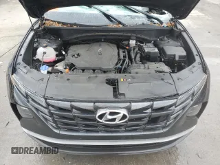 2023 Hyundai Tucson SEL with VIN 5NMJBCAE2PH270674, listed as a Copart auction lot 82879614 with 11,673 mi miles and Salvage Title. Bid and sale history available at DreamBid. Image 12.