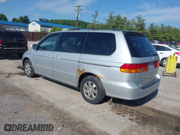 2004 Honda Odyssey EX z VIN 5FNRL18614B037143, wystawiony jako IAAI lot #42362262 z przebiegiem 203 023 mil mil oraz . Historia ofert i sprzedaży dostępna na DreamBid. Obrazek 3.