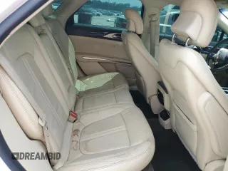 2014 Lincoln MKZ Hybrid z VIN 3LN6L2LU2ER816576, wystawiony jako Copart lot #57030235 z przebiegiem 221 863 mil mil oraz Szkoda całkowita • Salvage title. Historia ofert i sprzedaży dostępna na DreamBid. Obrazek 10.