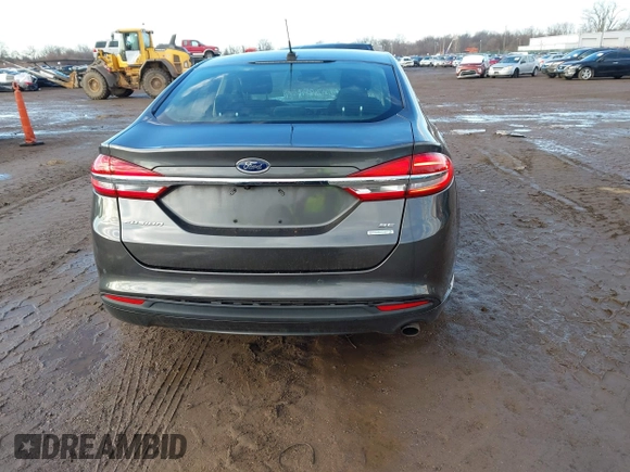 2018 Ford Fusion SE z VIN 3FA6P0HD7JR259606, wystawiony jako IAAI lot #41649797 z przebiegiem 94 094 mil mil oraz . Historia ofert i sprzedaży dostępna na DreamBid. Obrazek 16.