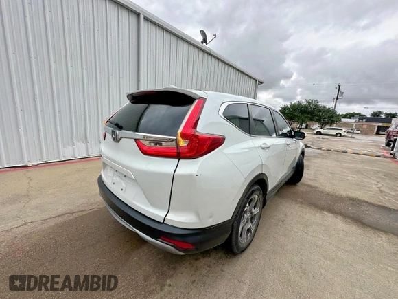 2019 Honda CR-V EX z VIN 7FARW1H50KE036985, wystawiony jako Copart lot #61110265 z przebiegiem 193 050 mil mil oraz Czysty tytuł • Clean title. Historia ofert i sprzedaży dostępna na DreamBid. Obrazek 4.