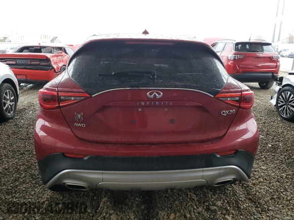 2018 Infiniti QX30 Premium with VIN SJKCH5CR7JA061030, listed as a Copart auction lot 86605824 with 94,717 mi miles and Clean title. Bid and sale history available at DreamBid. Image 6.