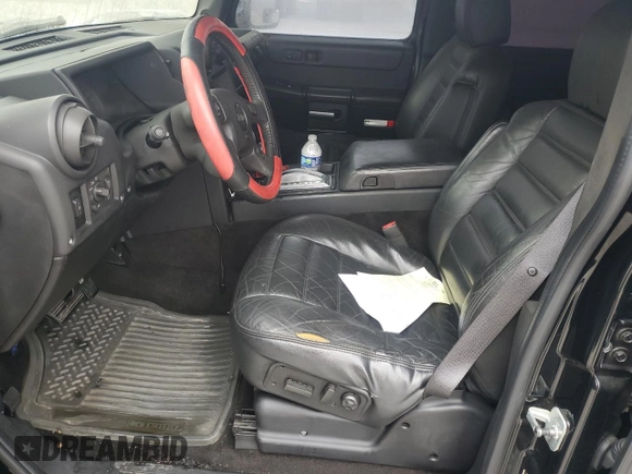 2005 Hummer H2 SUT z VIN 5GRGN22UX5H120312, wystawiony jako Copart lot #43948955 z przebiegiem Nie podano mil oraz Szkoda całkowita • Salvage title. Historia ofert i sprzedaży dostępna na DreamBid. Obrazek 7.