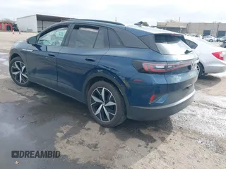 2023 Volkswagen ID.4 S z VIN 1V25MPE85PC057934, wystawiony jako IAAI lot #41135412 z przebiegiem 13 684 mil mil oraz . Historia ofert i sprzedaży dostępna na DreamBid. Obrazek 3.