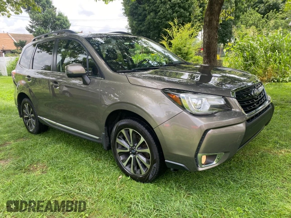2017 Subaru Forester Touring с VIN JF2SJGWC9HH402713, выставлен на аукционе Copart как лот 63635365 с пробегом 128 906 миль миль и Чистый • Clean title. История ставок и продаж доступна на DreamBid. Изображение 1.