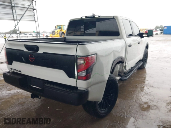 2024 Nissan Titan Pro-4X with VIN 1N6AA1EDXRN105077, listed as a IAAI auction lot 41545734 with 8,505 mi miles and . Bid and sale history available at DreamBid. Image 4.