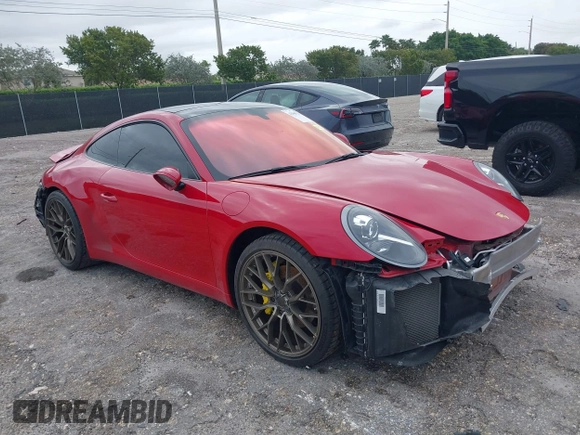 2018 Porsche 911 Carrera with VIN WP0AA2A92JS106143, listed as a IAAI auction lot 42009215 with 36,754 mi miles and . Bid and sale history available at DreamBid. Image 1.