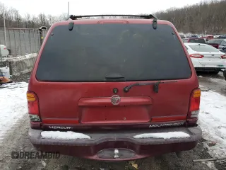 1999 Mercury Mountaineer with VIN 4M2ZU52E8XUJ22216, listed as a Copart auction lot 86806614 with 160,983 mi miles and Salvage title. Bid and sale history available at DreamBid. Image 6.