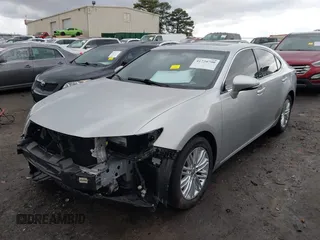 2013 Lexus ES 4dr Sdn with VIN JTHBK1GG1D2034954, listed as a IAAI auction lot 41720790 with 136,447 mi miles. Bid and sale history available at carsss.com. Image 2.