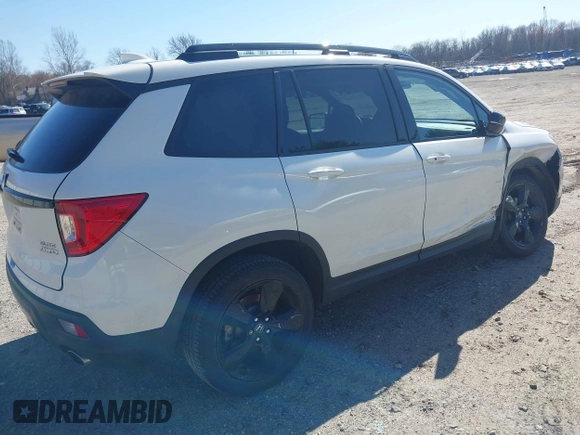 2019 Honda Passport Elite z VIN 5FNYF8H04KB005307, wystawiony jako IAAI lot #41828725 z przebiegiem 61 864 mil mil oraz . Historia ofert i sprzedaży dostępna na DreamBid. Obrazek 4.