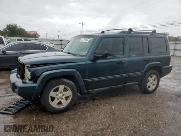 2006 Jeep Commander with VIN 1J8HH48NX6C125803, listed as a Copart auction lot 71247304 with 214,297 mi miles and Salvage Title. Bid and sale history available at carsss.com. Image 1.