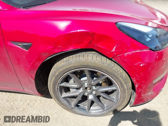 2023 Tesla Model 3 Long Range with VIN 5YJ3E1EBXPF603421, listed as a IAAI auction lot 42105037 with 13,186 mi miles and . Bid and sale history available at DreamBid. Image 6.