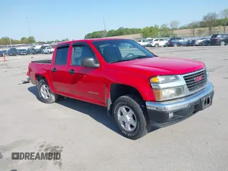 2005 GMC Canyon 1SF SLE Z71 z VIN 1GTDT136958204271, wystawiony jako IAAI lot #42211567 z przebiegiem 136 994 mil mil oraz . Historia ofert i sprzedaży dostępna na DreamBid. Obrazek 1.