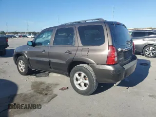 2006 Mazda Tribute S with VIN 4F2YZ04106KM28191, listed as a Copart auction lot 83150994 with 126,536 mi miles and Clean Title. Bid and sale history available at DreamBid. Image 2.