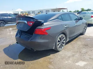 2016 Nissan Maxima SR z VIN 1N4AA6AP0GC400686, wystawiony jako IAAI lot #42378284 z przebiegiem 139 996 mil mil oraz . Historia ofert i sprzedaży dostępna na DreamBid. Obrazek 4.