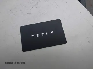 2024 Tesla Model 3 with VIN 5YJ3E1EA6RF731312, listed as a IAAI auction lot 41987407 with 5,025 mi miles and . Bid and sale history available at DreamBid. Image 11.