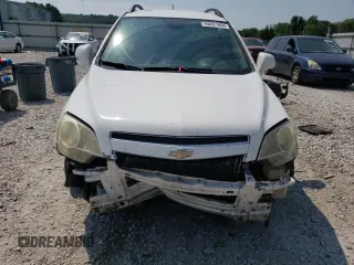 2014 Chevrolet Captiva Sport LS with VIN 3GNAL2EK7ES564267, listed as a Copart auction lot 68821054 with 76,529 mi miles and Clean Title. Bid and sale history available at DreamBid. Image 5.