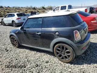 2010 MINI Hardtop S with VIN WMWMF7C57ATX43204, listed as a Copart auction lot 64771285 with 92,236 mi miles and Clean title. Bid and sale history available at DreamBid. Image 2.