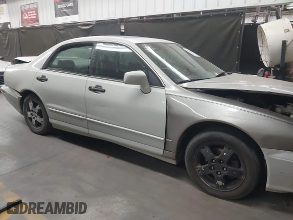 2003 Mitsubishi Diamante LS z VIN 6MMAP67P13T012396, wystawiony jako IAAI lot #40668729 z przebiegiem 157 250 mil mil oraz . Historia ofert i sprzedaży dostępna na DreamBid. Obrazek 14.