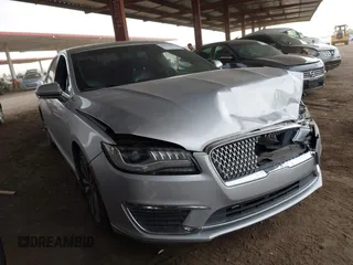 2017 Lincoln MKZ Reserve z VIN 3LN6L5E93HR603246, wystawiony jako IAAI lot #42024614 z przebiegiem 131 622 mil mil oraz . Historia ofert i sprzedaży dostępna na DreamBid. Obrazek 1.